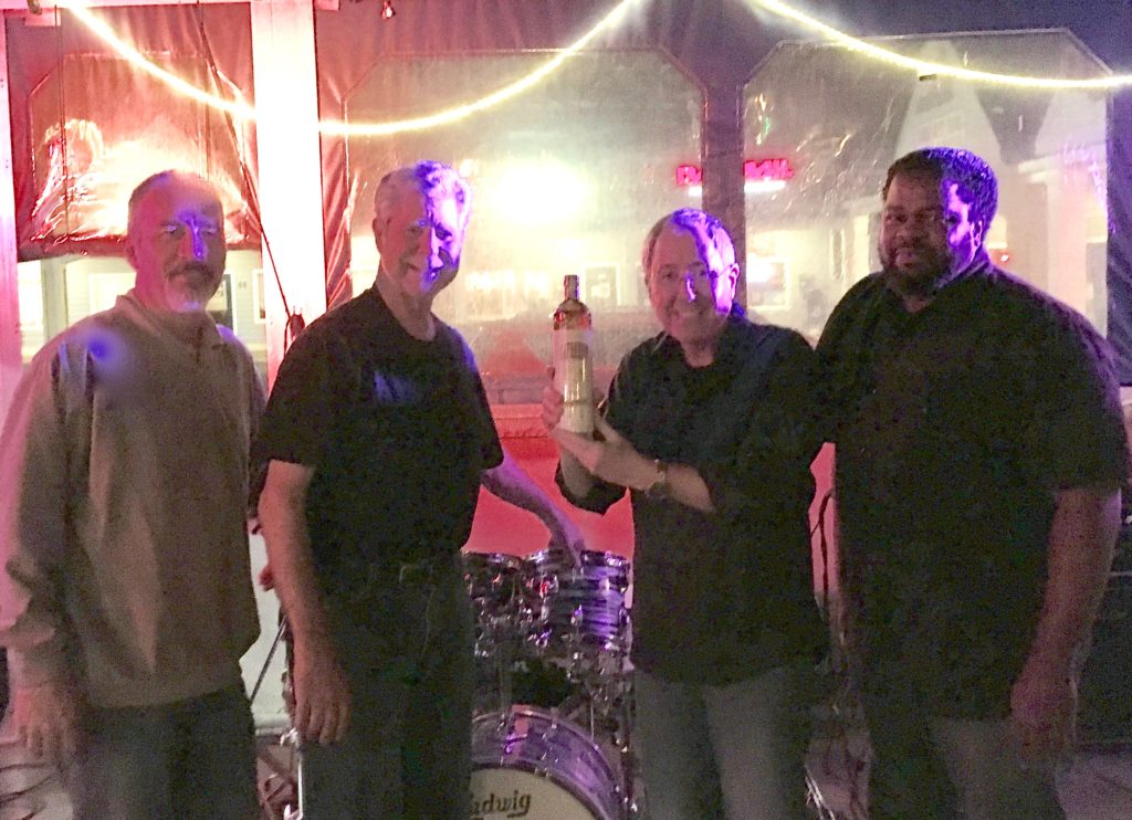 Gary, JW, Bill and Ronnie pose with a bottle of Cat Daddy Carolina Moonshine brought to them by pal Rob Bryant. Thanks Rob!